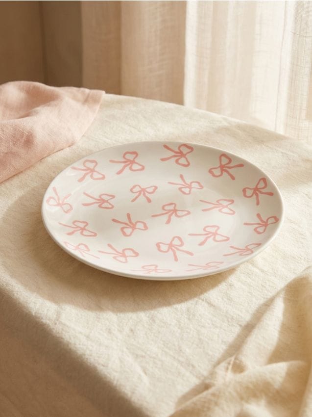 Sinsay - Farfurie ceramică cu motiv de fundițe - alb