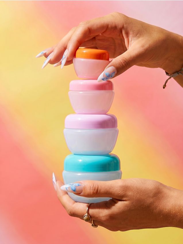 Sinsay - Set de 4 dozatoare cosmetice pentru voiaj - multicolor