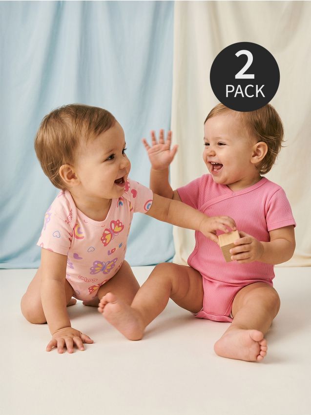 Sinsay - Set de 2 body-uri - roz-pastel