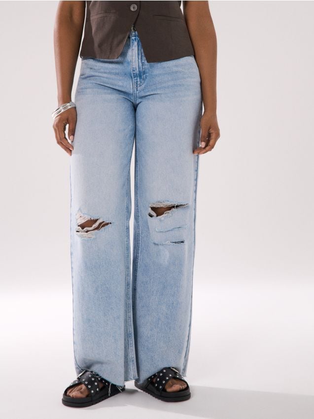 Jeansy wide leg z wysokim stanem i przetarciami - SINSAY