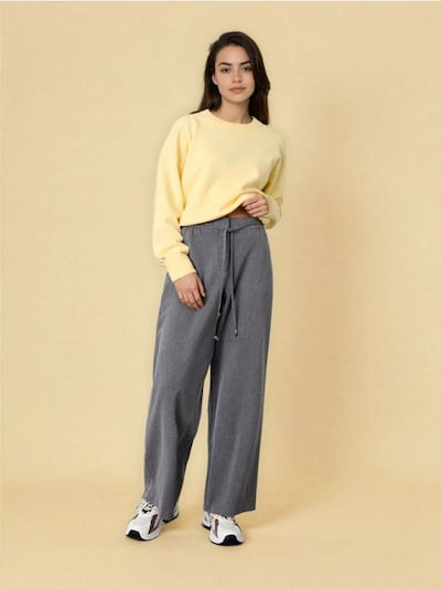 Тканинні штани з широкими штанинами