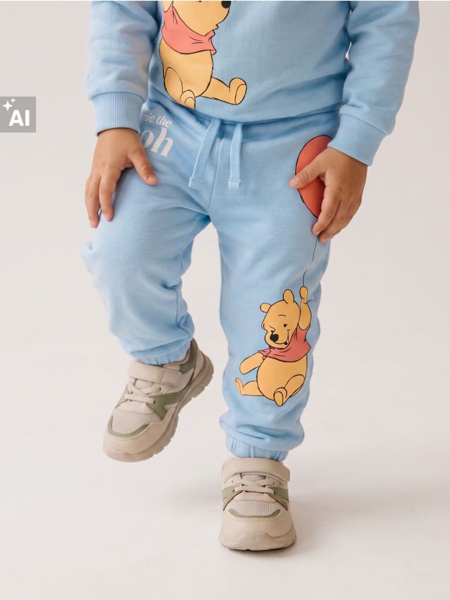 Sinsay - Pantaloni din bumbac jogger Winnie the Pooh - Gri-albăstrui