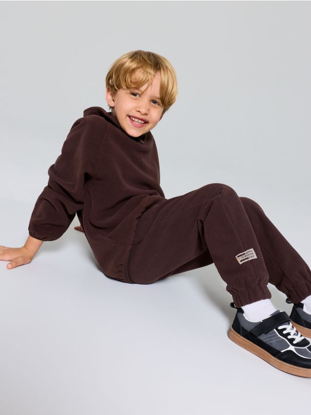 Sinsay - Pantaloni loose jogger căptușiți Active - maro-închis