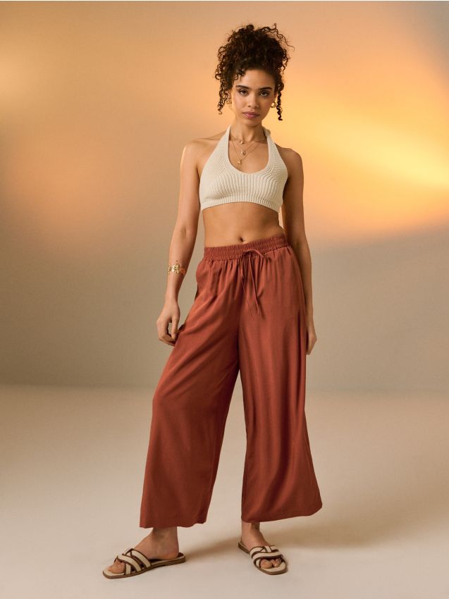 Sinsay - Pantaloni cu picior larg din viscoză - chihlimbariu