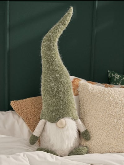 Božićna dekoracija u obliku patuljka