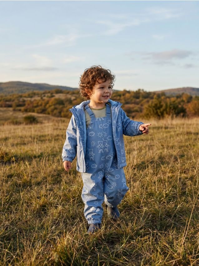 Sinsay - Salopetă impermeabilă cu elemente reflectorizante și motiv cu ursuleți - mid blue