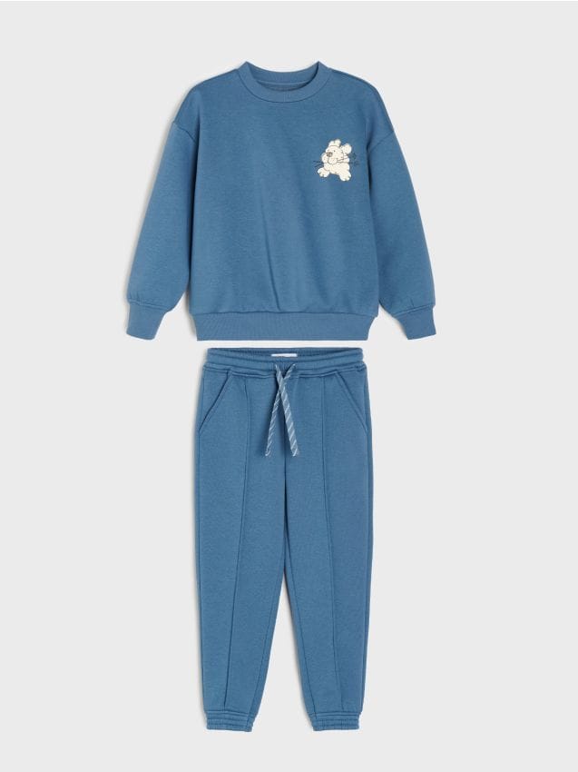Sinsay - Compleu sport: bluză și pantaloni cu imprimeu cu un câine pe schiuri - mid blue