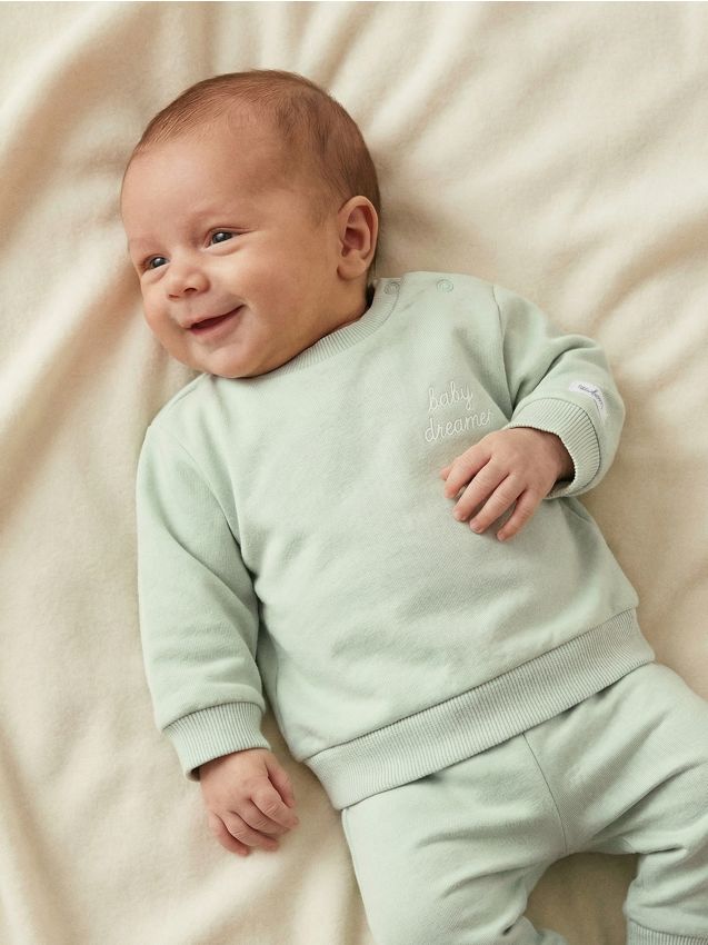 Sinsay - Hanorac din bumbac cu inscripție pe spate - verde-pal