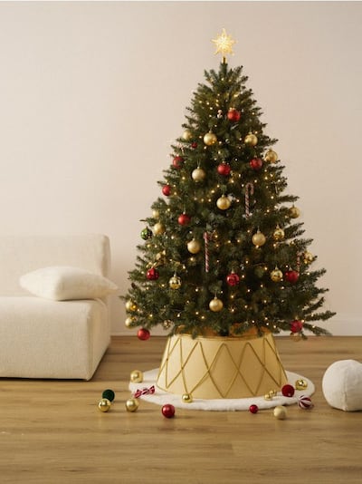 Okrasna zaščita lončka za božično drevo