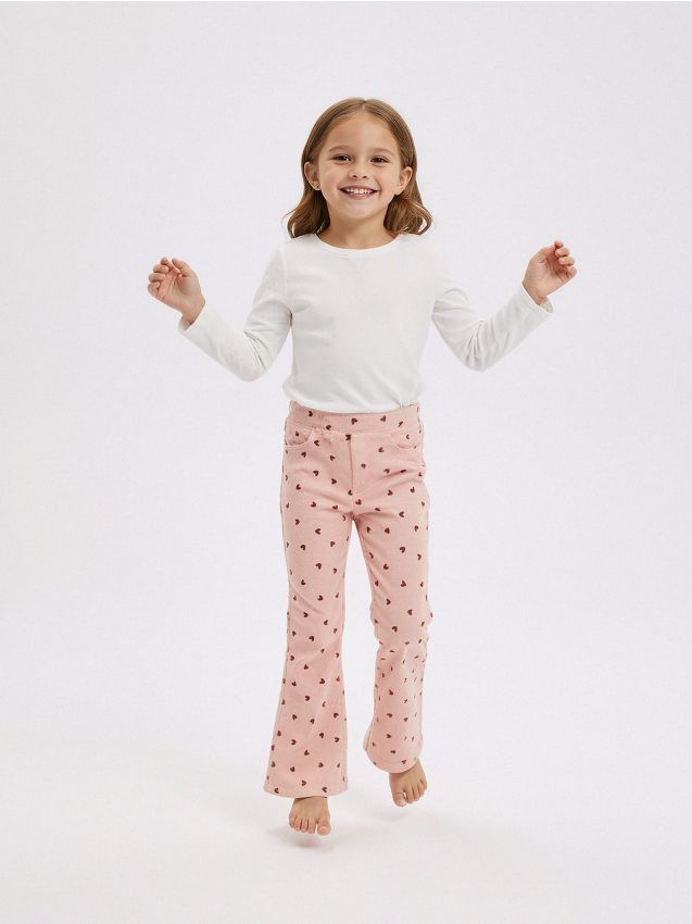 Sinsay - Prążkowane spodnie dzwony ze wzorkiem - różowy