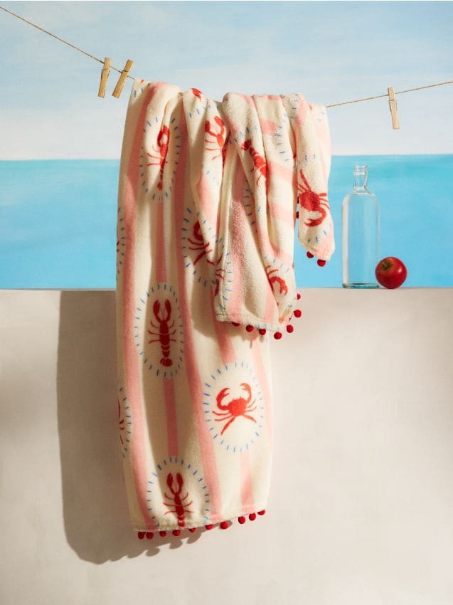 Sinsay - Pătură cu motiv marin și pompoane - corai