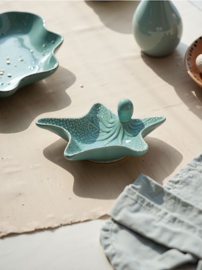 Taca dekoracyjna w kształcie rozgwiazdy z małą ośmiornicą