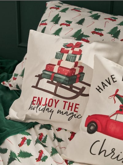 Božična prevleka za blazino s potiskom daril