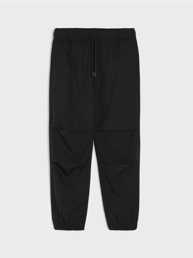 Sinsay - Pantaloni parachute termoizolați cu căptușeală din fleece Active - negru