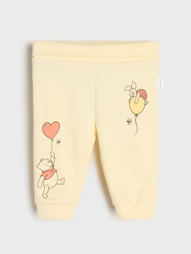 Sinsay - Pantaloni sport jogger Winnie the Pooh - galben-deschis