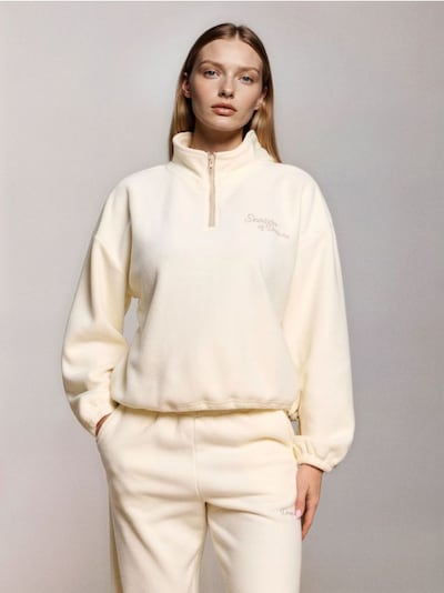 Флісова кофта з короткою блискавкою та регульованим низом зі стоперами