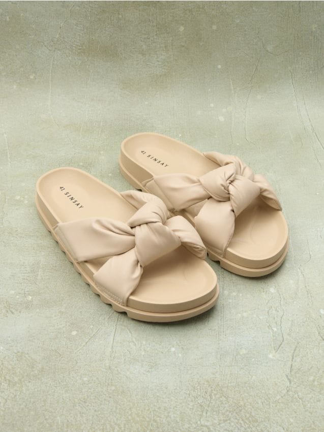 Sliders with decorative knot