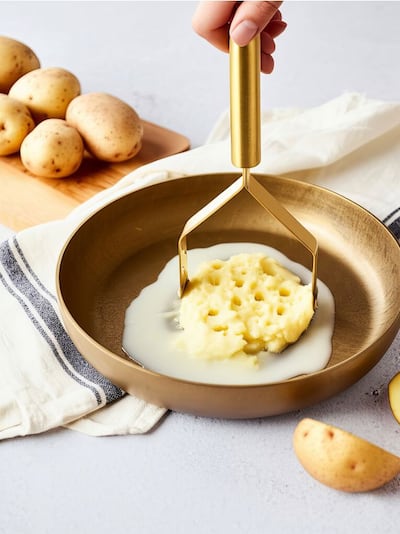 Gnetilnik za krompir iz nerjavečega jekla