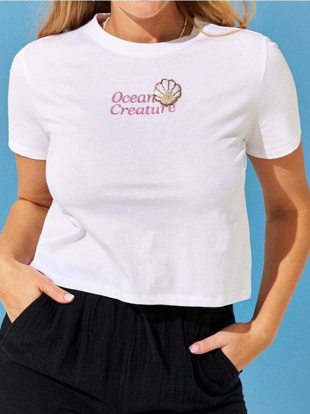 Crop-Top aus Baumwolle mit Schriftzug - SINSAY